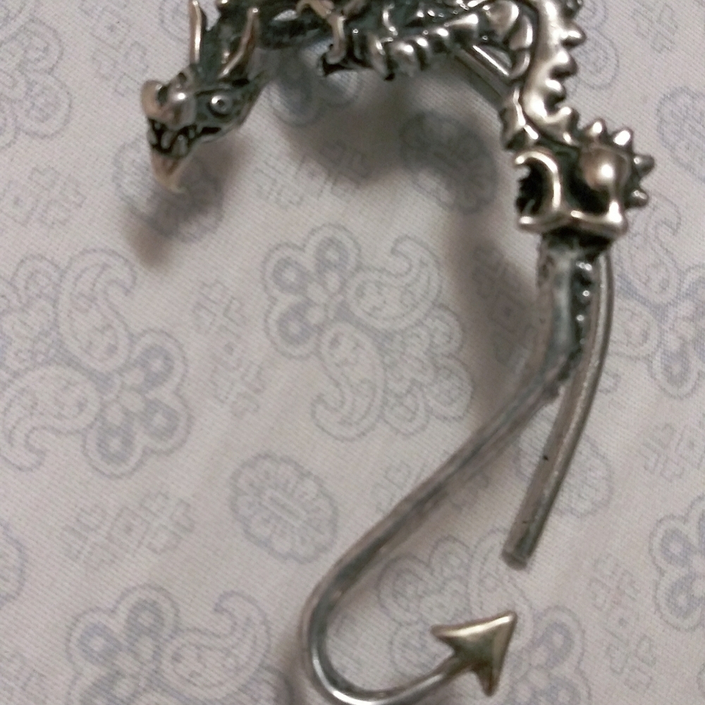 Sterling silver dragon earring.Excellent condition